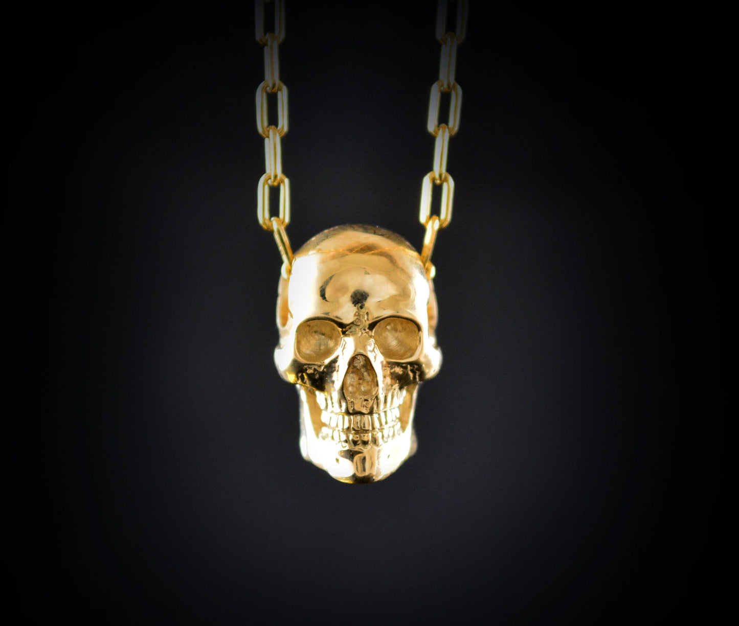 Colgante cráneo humano en oro, Calavera hecha a mano en oro de 14k y 18k - D´Cast
