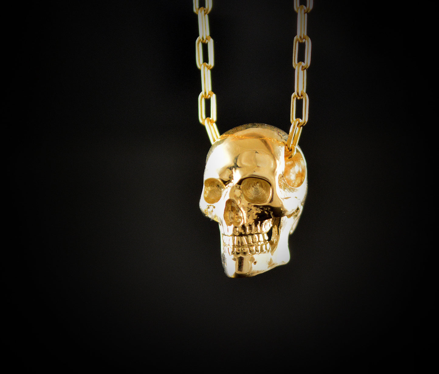 Colgante cráneo humano en oro, Calavera hecha a mano en oro de 14k y 18k - D´Cast