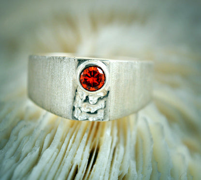 Solitario acéntrico, Anillo sello pequeño