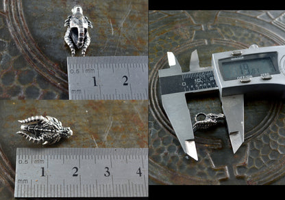 Pequeño colgante cabeza de dragon, Hecho a mano en plata deley maciza, Joyerias mistica y mitologica