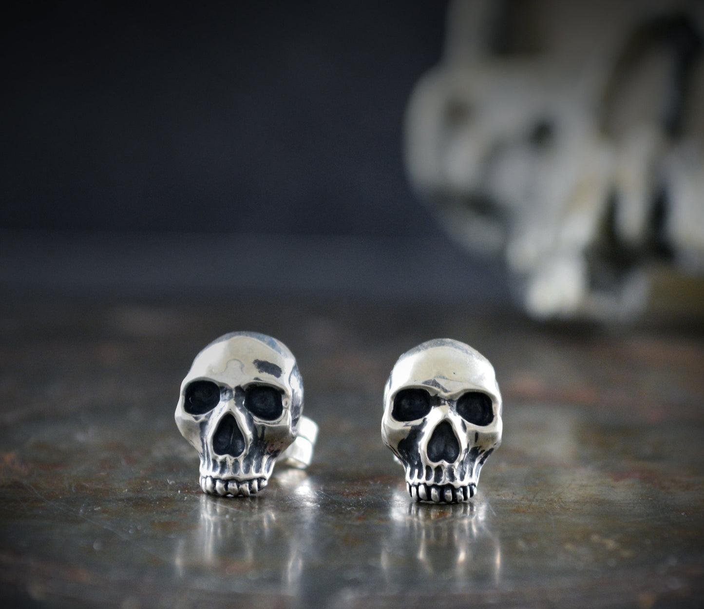 Memento mori skull earrings in solid sterling silver