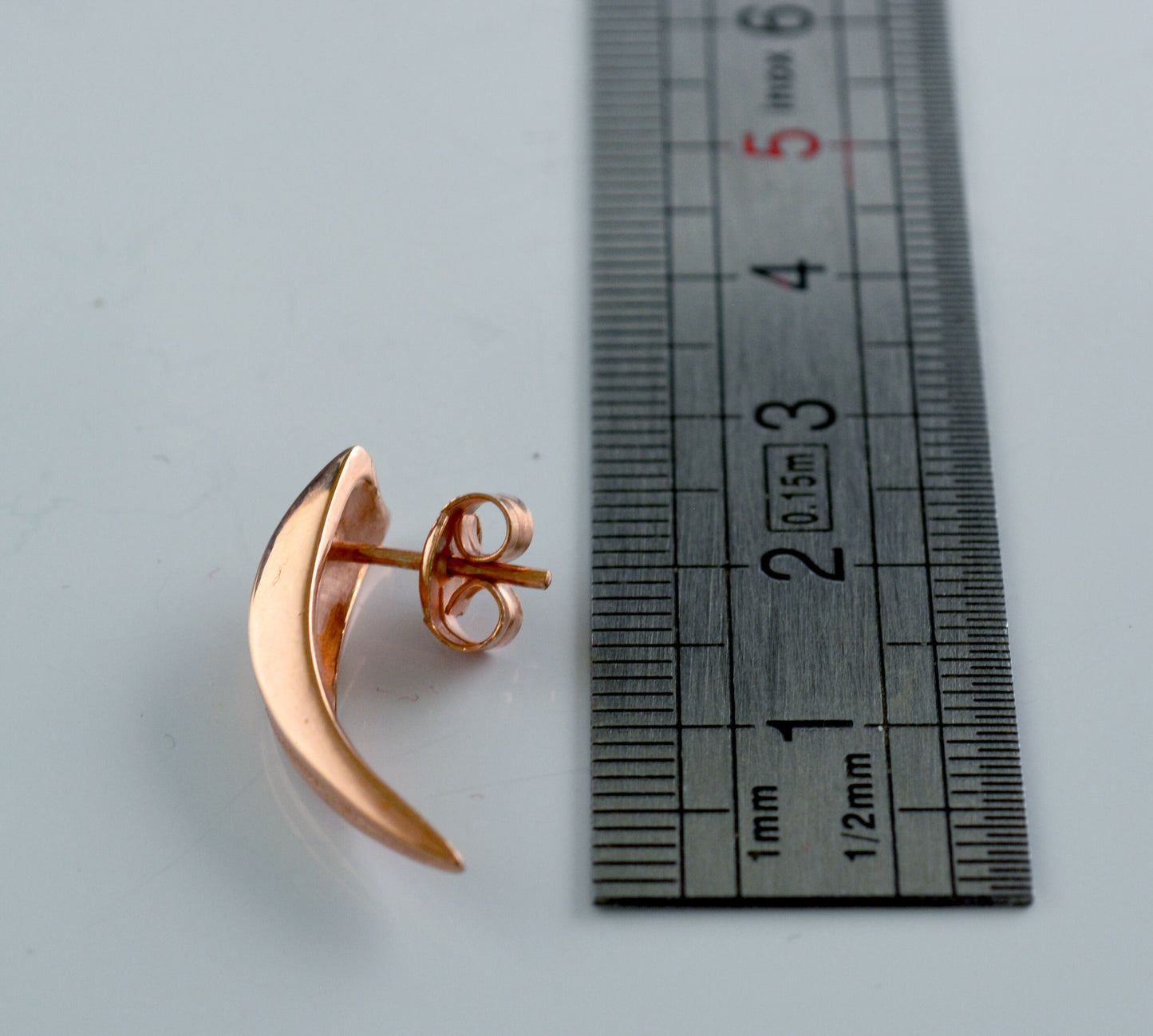 Silver tusk earrings with rose gold plating, Silver claw earring